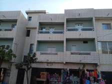 VENTE D'UNE MAISON D'UN IMMEUBLE R+2