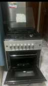 A VENDRE CUISINIÈRE 4 FEUX