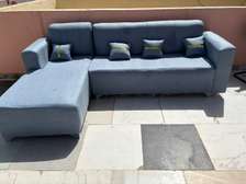 Canapé d'angle bleu clair moderne 5 coussins tissu