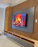 Meuble TV moderne bois naturel et laqué 2025