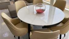 TABLE A MANGER RONDE-RECTANGLE EN MARBRE  EXTENSIBLE