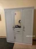 Armoire de rangement 4 battants