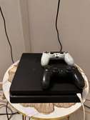 PS4 slim + 4 jeux