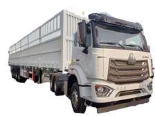 Howo nx 6x4 400hp + semi-remorque cargo