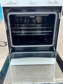 cuisinière 4 feux et four tout à gaz