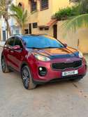 Kia Sportage SUV compact rouge dynamique