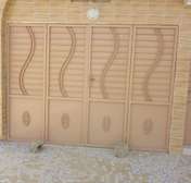 porte et grille en fer forgé
