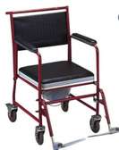Chaise roulante avec pot neuve