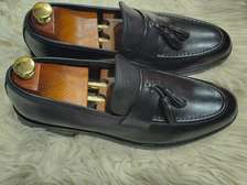 Mocassins cuir noir pompons style classique