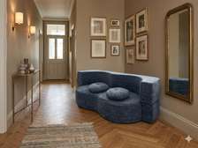 Canapé design  courbe compact avec coussins