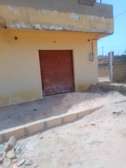 Magasin à Louer à Touba Mbal à côté du marché Ocass