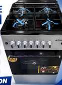 cuisinière gaz 4 feux noir inox avec four