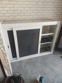 Vitrine coulissante aluminium blanc avec volet intégré