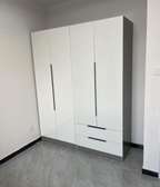 Armoire blanche 4 portes  tiroirs design moderne