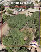Terrain clôturé à vendre à Warang