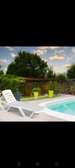 Transat jardin blanc inclinable robuste et confortable