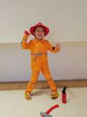 Déguisement pompier enfant orange avec casque et accessoires