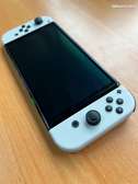 Switch oled flashe+10jeu
