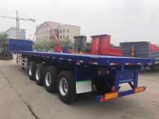 Semi remorque à plateau 4 essieux