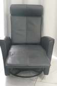 Fauteuil en cuir manuel