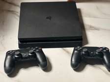 PS4 Slim flashé 20 jeux 2 manettes