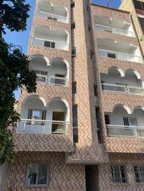 Appartement lumineux avec balcon et façade briques