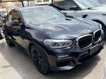 BMW X4 SUV coupé noir jantes noires