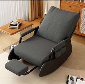 Fauteuil relax gris foncé avec repose-pieds intégré