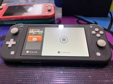 Nintendo switch Lite flashé +10Jeux