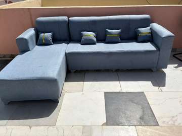 Canapé d'angle bleu clair moderne 5 coussins tissu