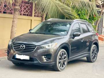 Mazda CX-5 SUV compact gris automatique essence