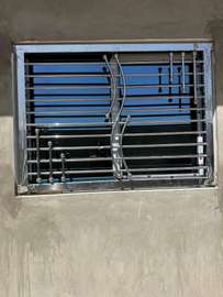 Grille fenêtre acier inoxydable design moderne 60x40cm