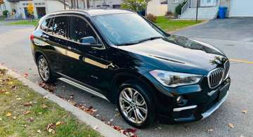 BMW X1 SUV compact noir performant et confortable