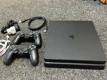 PS4 Slim 1 Téra + 20Jeux