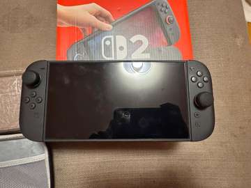 Nintendo Switch 2 NEUVE + 2 jeux (FC26  Street Fighter 6)