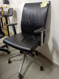 Fauteuil bureau cuir noir ergonomique avec roulettes