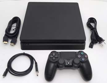 PlayStation 4 slim flash 12.50 avec 7 jeux 2 manette