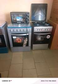 Cuisinière gaz 4 brûleurs four gris métallisé