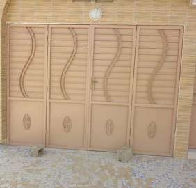 porte et grille en fer forgé
