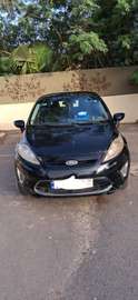 Je suis en voyage. Appelez moi sur whatsapp