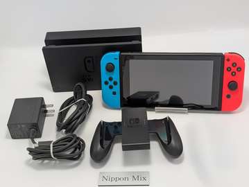 Nintendo switch complet + 15 JEUX