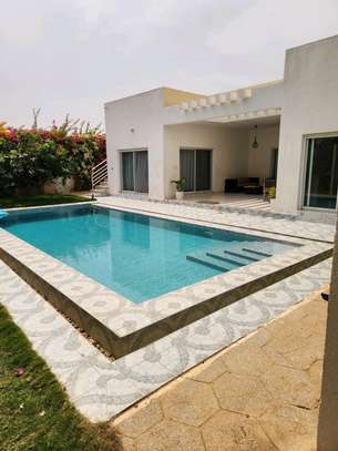 Belle villa basse à louer image 1