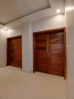 Appartement avec piscine commune et salle de sport image 14