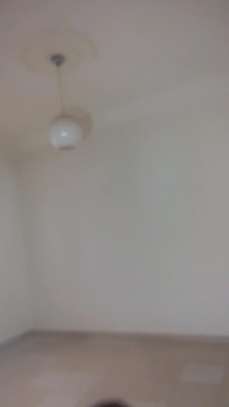 A louer grand appartement rdc image 7