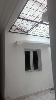 A louer grand appartement rdc image 6