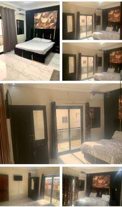 Appartements meublés deux chambres Salon image 12