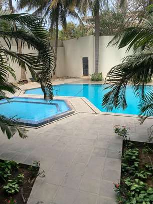 Appartement duplex accès piscine jardin privé Fann Résidence image 1