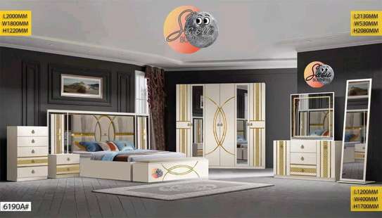 CHAMBRE A COUCHER ARMOIRE 6BATTANTS
6PIECES image 3
