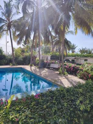 UN TRES JOLI APPARTEMENT AVEC PISCINE JARDIN ET VUE SUR  MER image 5