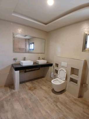 Appartement avec piscine commune et salle de sport image 10